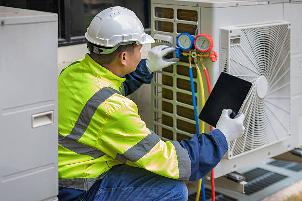 Professional Hvac technician working in Greenville, RI